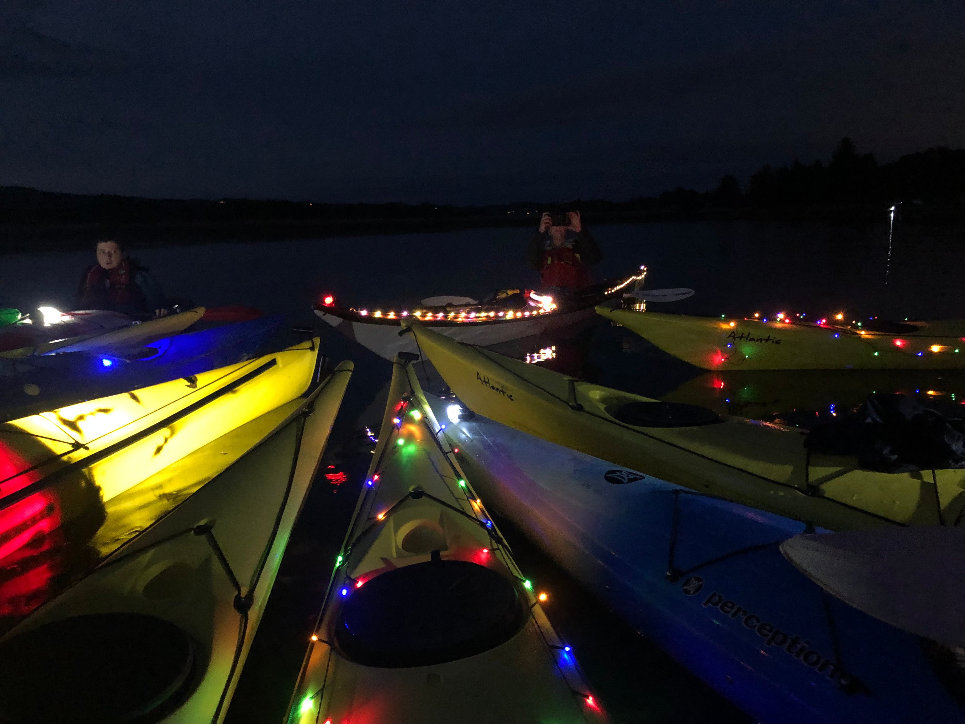 Garnock Canoe Club on water - night time lights